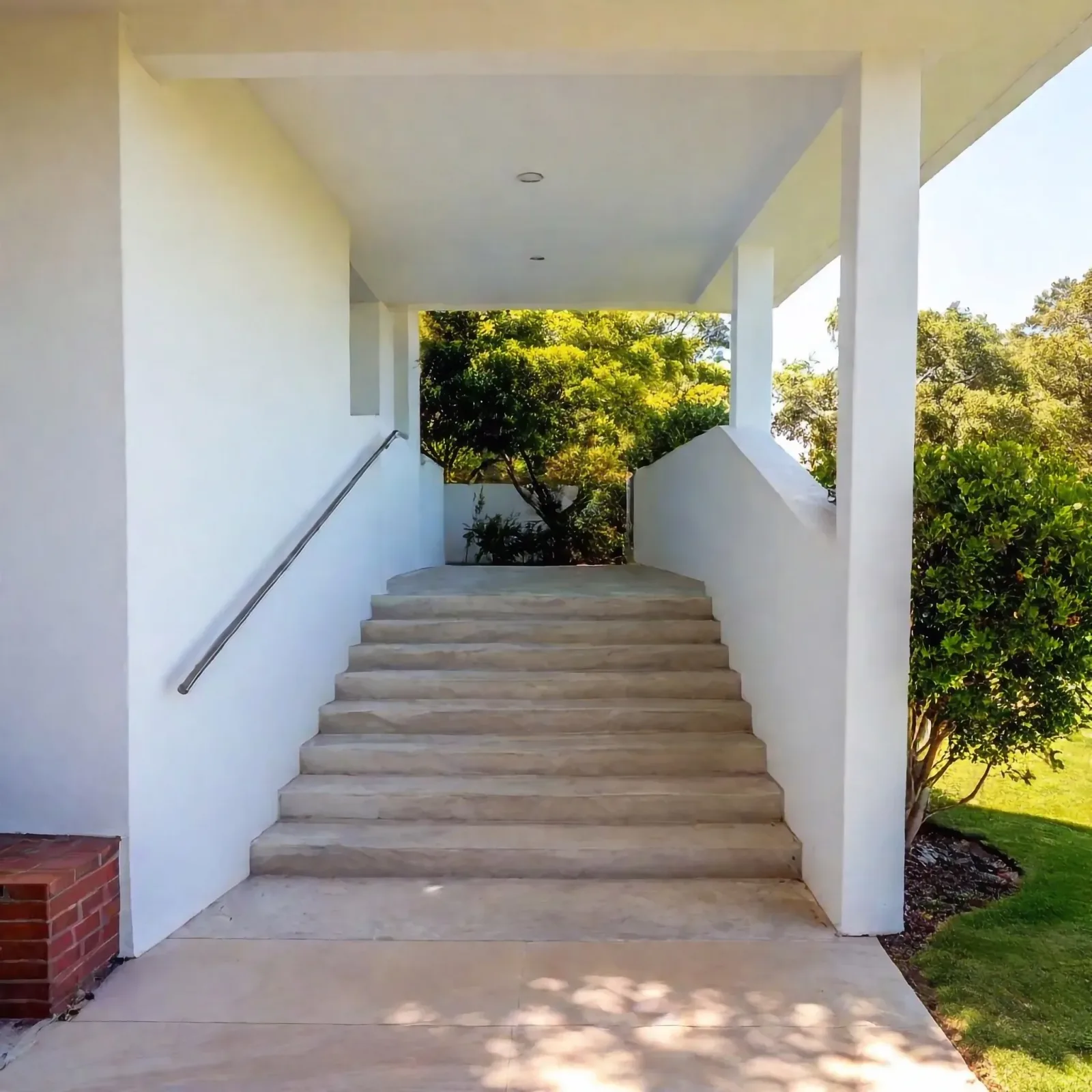 Concrete steps finished to match the surrounding paving