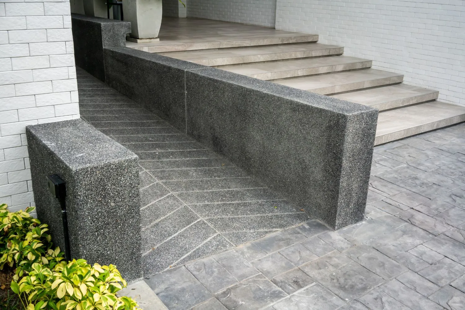 Concrete ramp providing accessible entry