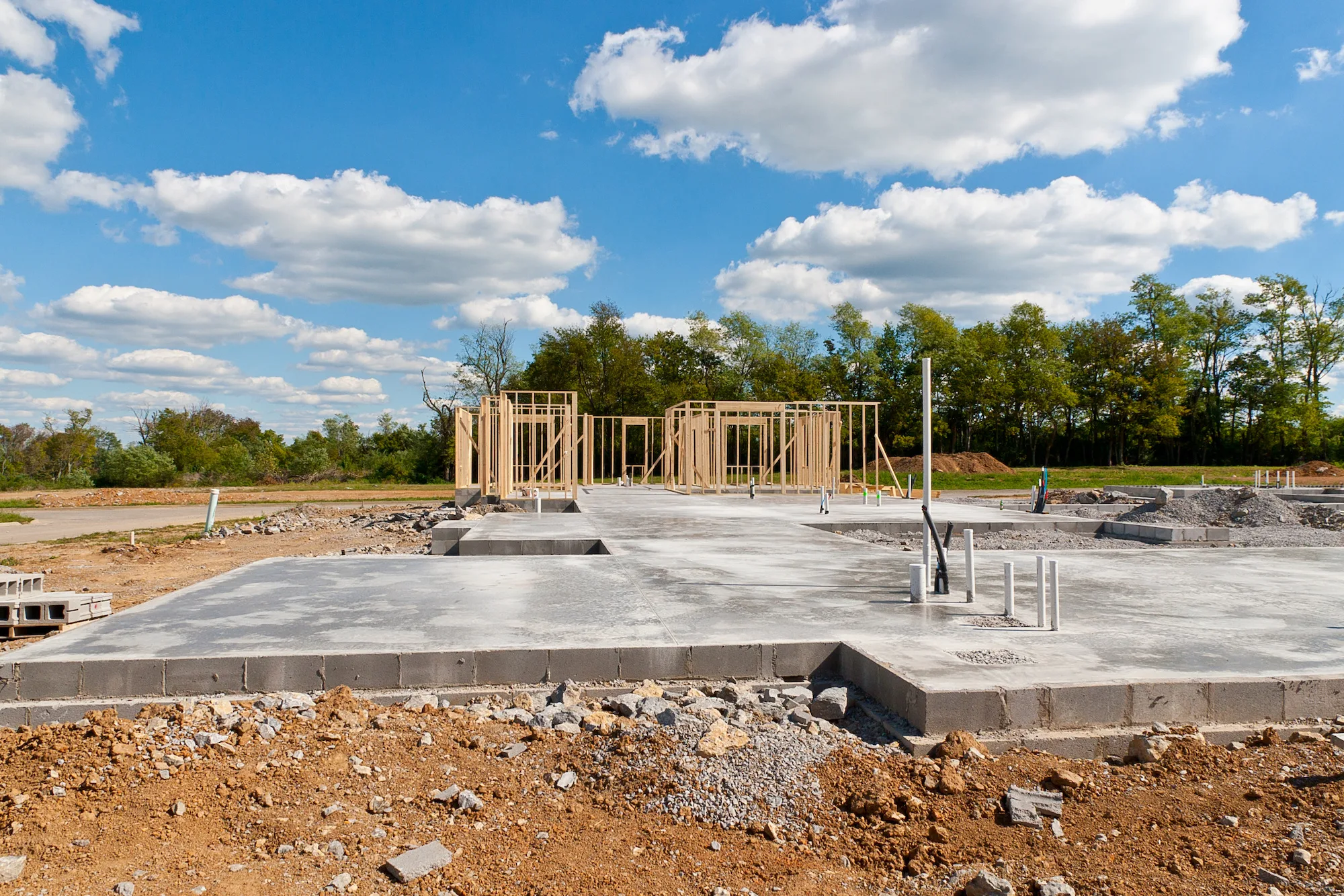 Freshly poured and levelled concrete slab ready for construction