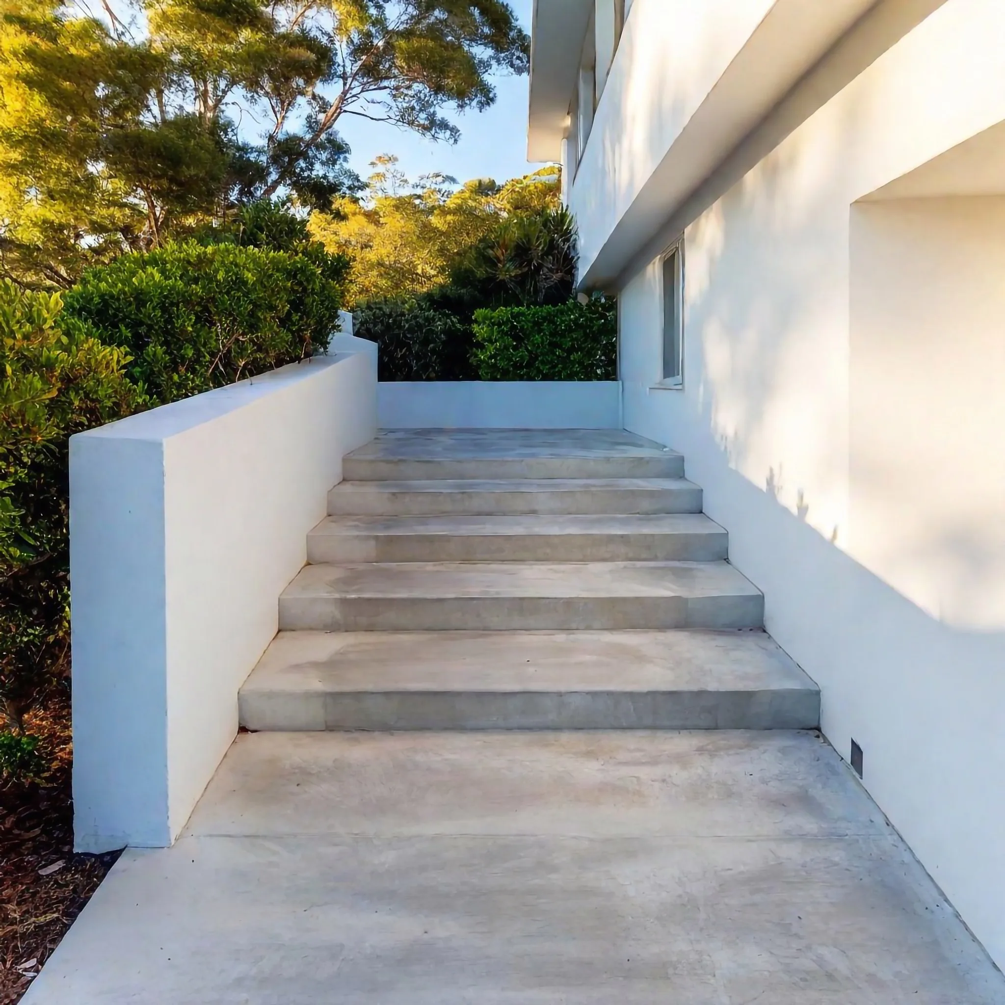 Concrete steps with handrail on a Geelong property