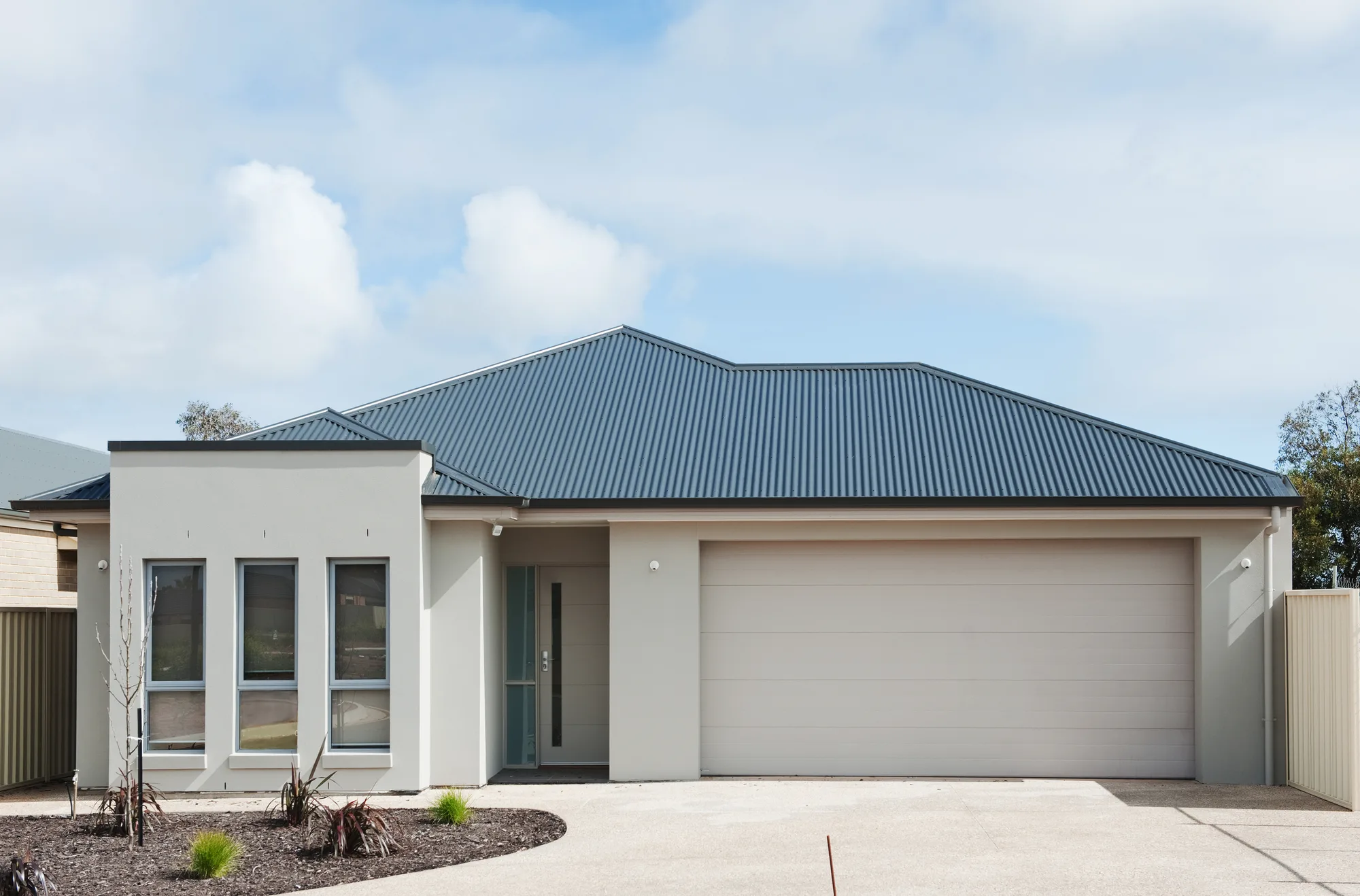 Plain concrete driveway with smooth trowelled finish
